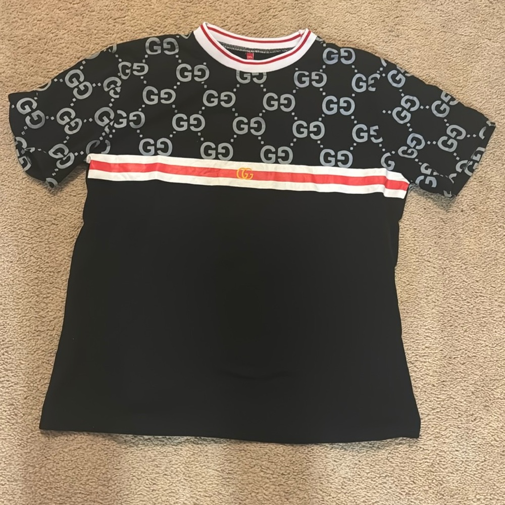 T Shirt Men’s. More like an XL NWOT